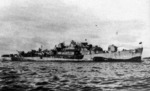 Destroyer escort USS Tabberer at Ulithi showing that she had been dismasted by Typhoon Cobra, 22 Dec 1944.