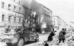 Soviet troops in US-built M3A1 scout car fighting in Vienna, Austria, Apr 1945