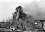 Prudential building in Warsaw, Poland exploding as it was hit by a shell from a German Karl-Gerät self-propelled howitzer, 28 Aug 1944; viewed from the top of the building at the address Mikołaja Kopernika 28 about 300 meters to the east