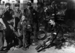 Polish fighters Andrzej Maringe, Stanislaw Potworowski, and others of Battalion Czata 49 with PIAT launchers, Aug 1944