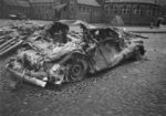 A wrecked car in Hietalahdentori square in Helsinki, Finland, late 1939-early 1940