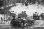 T-26 light tanks and GAZ-A trucks of Soviet 7th Army, Finland, 2 Dec 1939