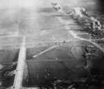 Kagi Airfield under carrier aircraft attack, Taiwan, 12 Oct 1944, photo 5 of 5
