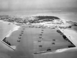 PB2Y-3 Coronado aircraft of US Navy squadrons VP-13 and VP-102 in the submarine basin of Sand Island, Midway Atoll, 29 Jan 1944