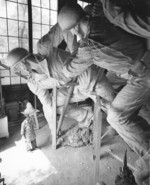 Sculptor Felix de Weldon working on the plaster model of the US Marine Corps War Memorial, circa 1954, photo 3 of 7