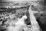 US bombers attacking Lamsepo Airfield with parafrag bombs, Linkou, Taiwan, 14 Apr 1945, photo 2 of 3