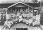 School teacher in Taiwan in group photograph with his students shortly after receiving conscription orders from the Japanese authorities, 21 May 1942