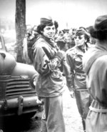 Tech. Sgt. Tommye Berry, Acting 1st Sgt. of an US Army WAC African-American unit, at Transportation Corps staging area of Camp Shanks, New York, United States, 16 Apr 1945