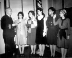 US Navy Cmdr. Thomas Gaylord administering oath to five new nurses commissioned in New York, United States, 8 Mar 1945; Phyllis Mae Dailey, USN