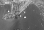 Bombs dropping in Toshien harbor, Takao (now Zuoying harbor, Kaohsiung), Taiwan, 16 Oct 1944