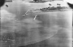 View of Toshien harbor (now Zuoying harbor), Takao (now Kaohsiung), Taiwan, 12 Oct 1944, photo 2 of 2; photo taken by aircraft of USS Enterprise