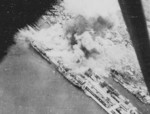 Takao (now Kaohsiung) harbor, Taiwan under US Navy carrier aircraft attack, 12 Oct 1944, photo 2 of 6