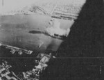Takao (now Kaohsiung) harbor, Taiwan under US Navy carrier aircraft attack, 12 Oct 1944, photo 4 of 6