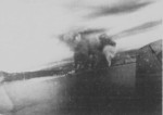 Takao (now Kaohsiung) harbor, Taiwan under US Navy carrier aircraft attack, 12 Oct 1944, photo 6 of 6