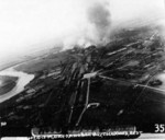 Rail marshaling yard at Shinei District (now Xinying District), Tainan, Taiwan under carrier air attack, 13 Oct 1944; note original caption was mis-labeled