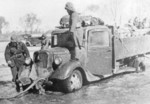 Japanese truck stuck in flood waters, circa late 1930s