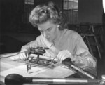 Female US Marine Private Arline MacKenzie working with a contour finder during map making training at Camp Lejeune, Jacksonville, North Carolina, United States, circa 1943