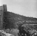 Japanese soldiers marching along the Great Wall, China, circa late 1937