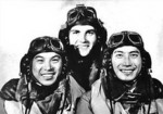 Chinese pilots Chu Yuzhang (left) and Xie Lihe (right) with a unidentified British Fleet Air Arm pilot, aboard a British aircraft carrier, circa 1944