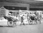 African-American servicemen riding rickshaws in India, Jul 1943