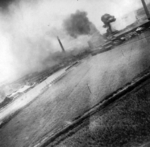 Nansei sugar plant under US air attack, Kagi (now Chiayi), Taiwan, 24 Apr 1945, photo 2 of 3