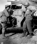 War Correspondent Ted Stanford of The Pittsburgh Courier interviewing African-American US Army Sergeant Morris O. Harris of the 784th Tank Battalion of the 9th Army, 28 Mar 1945