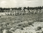 Japanese-American members of US 442nd Regimental Combat Team marching band during the first formal review of the regiment, Camp Shelby, Mississippi, United States, 1943