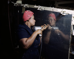 African-American woman working on a part of an A-31 Vengeance dive bomber at Vultee-Nashville plant, Tennessee, United States, Feb 1943