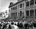 Crowd gathering at the Iolani Palace grounds to welcome returning Japanese-American troops of US 442nd Regimental Combat Team, Honolulu, US Territory of Hawaii, 9 Aug 1946