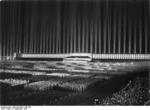 Nazi Party rally at Zeppelinfeld, Nuremberg, Germany, 8 Sep 1936; the structure was designed by Albert Speer