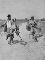 Chinese soldiers carrying supplies on their shoulders, Burma, 1940s