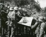 Chinese troops with a captured Japanese flag, date unknown