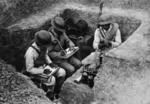 Chinese Army radio operators in a trench, China, circa late 1930s