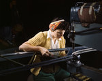 American woman riveting join sections of wing ribs that would later go into a B-17F Flying Fortress bomber, Douglas Aircraft Company plant, Long Beach, California, United States, Oct 1942