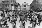 Troops of the Soviet 62nd Stalingrad Army marching in Odessa, Ukraine, Apr 1944; note two female soldiers in foreground