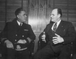 African-American US Maritime Service Captain Clifton Lastic of Liberty Ship SS Bert Williams talking with President of National Maritime Union Joe Curran, date unknown