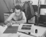 USAAF officer preparing a propaganda leaflet, Saipan, Mariana Islands, 1945