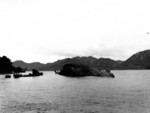 Capsized Japanese ship, near Kure, Japan, late 1945