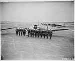 Major James A. Ellison reviewed the first class of Tuskegee cadets, Tuskegee, Alabama, United States, 1941, photo 1 of 2; note Vultee BT-13 trainer aircraft