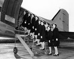 WAVES personnel boarding a R4D-6 transport aircraft while en route to Naval Air Station, Olathe, Kansas, United States, 13 Nov 1944