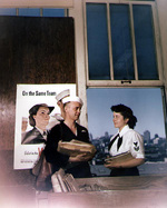 US Navy Mailman 2nd Class Wilbur L. Harrison and Yeoman 1st Class Marjorie Daw Adams at Fleet Post Office, San Francisco, California, United States, 13 Jun 1945