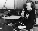 WAVES Specialist (Teacher) Katherine Dillon monitoring a radio range chart, while serving as a Link trainer instructor at Naval Air Station, St. Louis, Missouri, United States, 3 Nov 1943