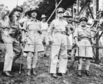 Australian Brigadier Charles Spry pointing out locations of heavy fighting to Australian LtGen Edmund Herring, American Gen Douglas MacArthur, and Australian MajGen Arthur Allen, New Guinea, Oct 1942