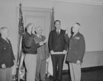General Dwight Eisenhower swearing General Omar Bradley into office as Chief of Staff of the US Army, Pentagon, Arlington, Virginia, United States, 7 Feb 1948, photo 2 of 3; note US President Harry Truman and Secretary of Army Kenneth Royall in background