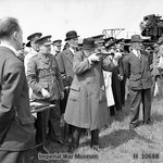 Winston Churchill took aim with a Sten gun during a visit to the Royal Artillery experimental station at Shoeburyness in Essex, England, United Kingdom, 13 Jun 1941