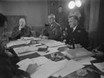 Winston Churchill, Archibald Wavell, and James Somerville in conference aboard the ship Queen Mary, May 1943