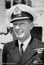Captain John Collins on the day that he handed over control of HMAS Shropshire to the Royal Australian Navy, 1943