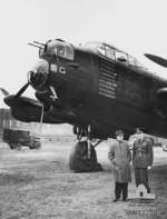 Prime Minister John Curtin and Captain Hugh Edwards before Lancaster bomber 