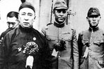 Chairman Demchugdongrub of the Mengjiang puppet government with Li Shouxin and a Japanese officer, Kalgan, Chahar Province, China, circa 1940s