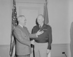 US President Harry Truman awarding General Dwight Eisenhower the third Oak Leaf Cluster to the Distinguished Service Medal, Pentagon, Virginia, United States, 7 Feb 1948, photo 1 of 2